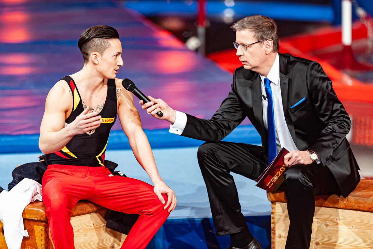 Günther Jauch and athlete Marcel Nguyen during "Menschen, Bilder, Emotionen" TV show on December 9th, 2012